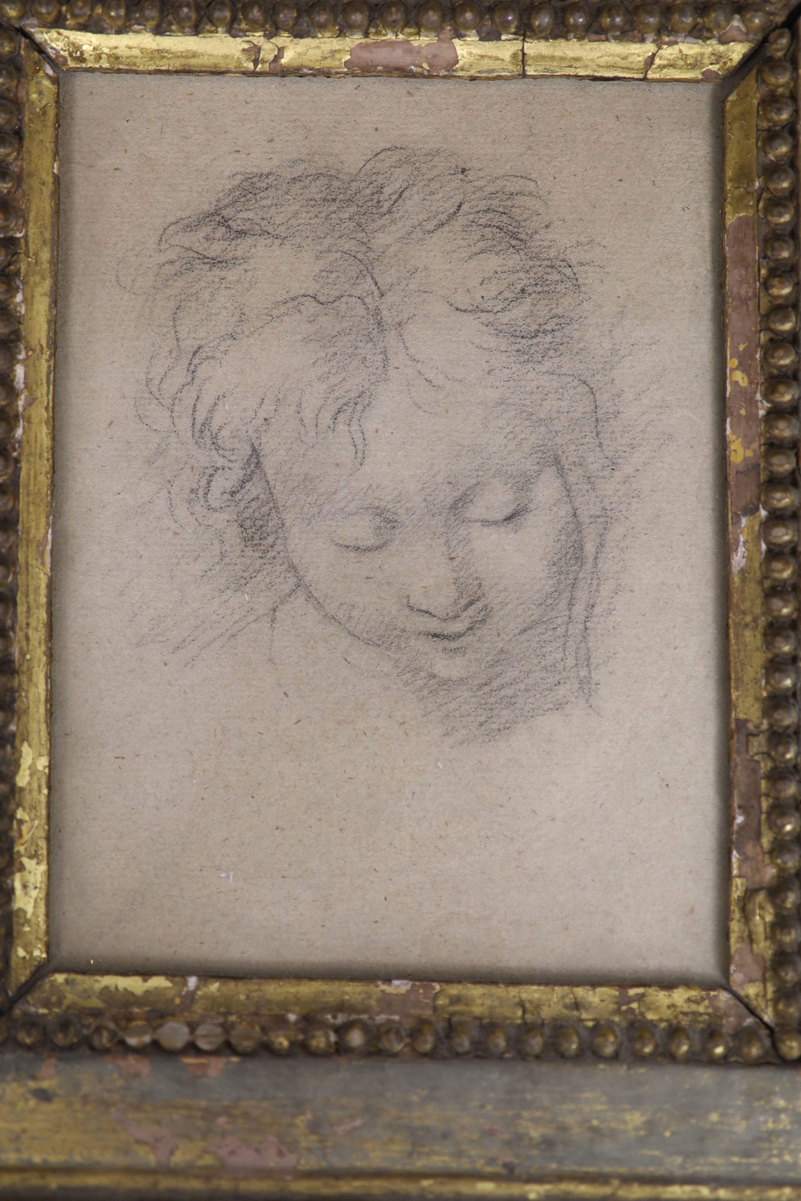 A 17th century drawing of child's head and a small sepia engraving. 14 x 10.5cm. & 12 x 10cm.